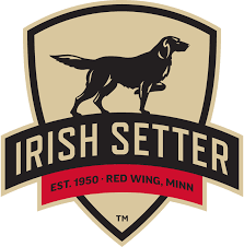 Irish Setter logo with a black dog silhouette on a tan shield and red banner reading “Est. 1950 · Red Wing, Minn.”