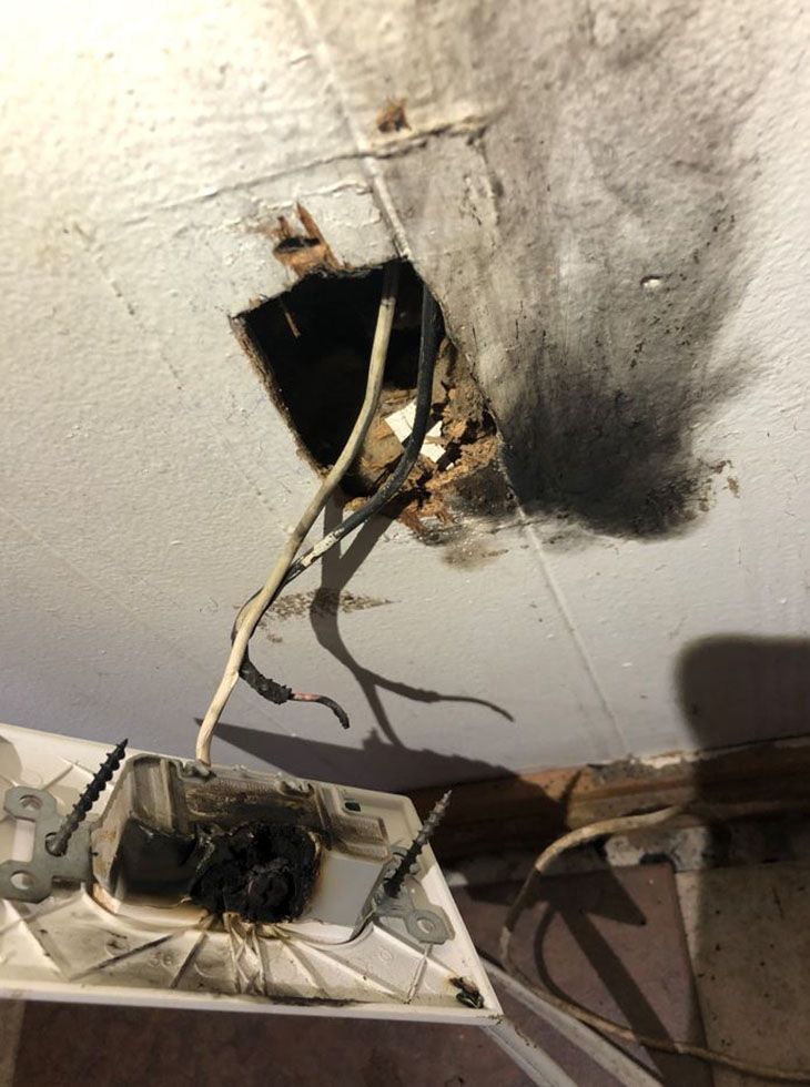 Dangerous burnt electrical outlet and wires