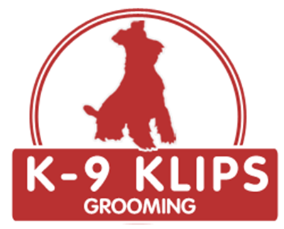 K-9 Klips Grooming logo with red silhouette of a dog inside a circle