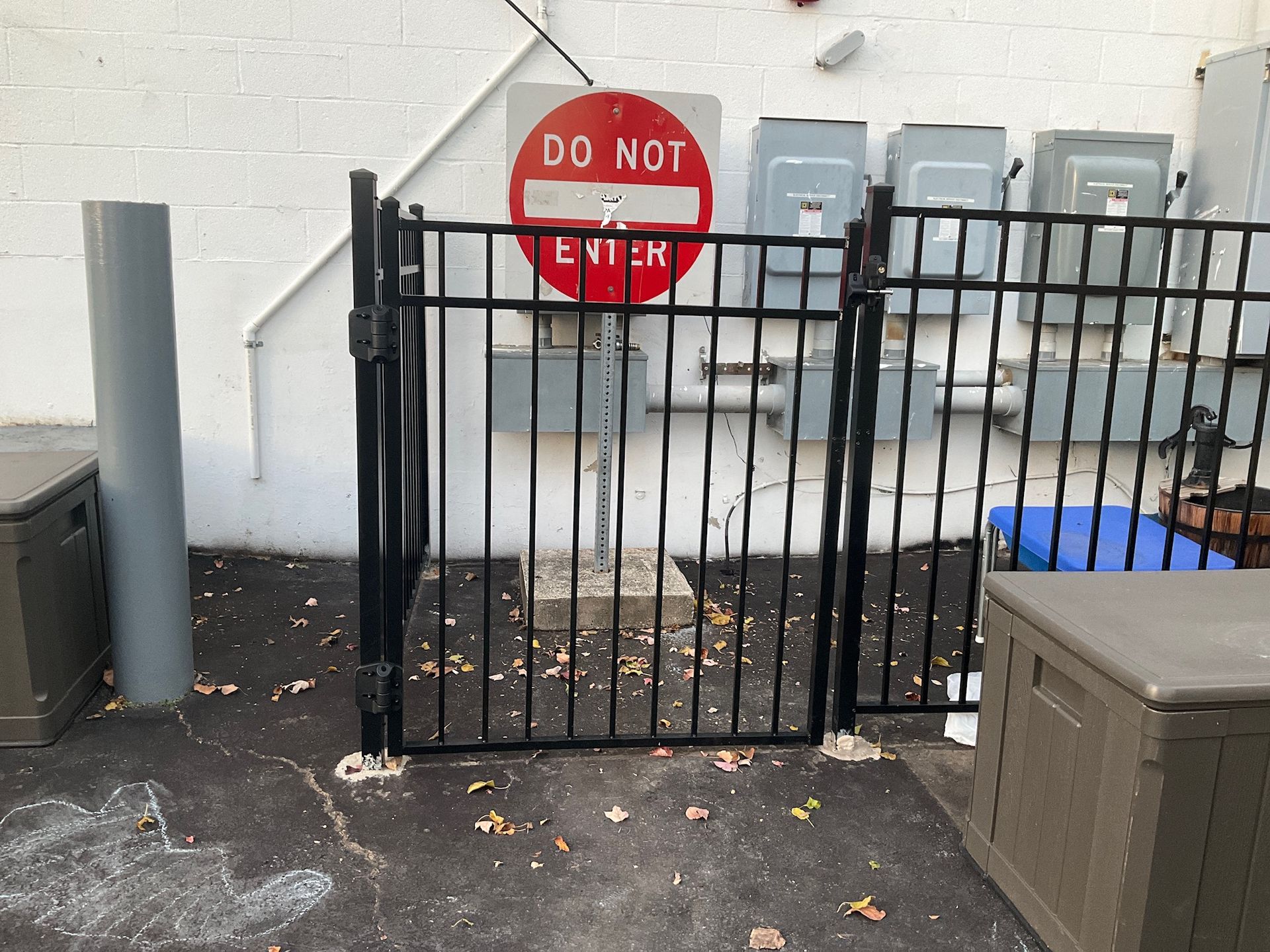 Black metal gate with