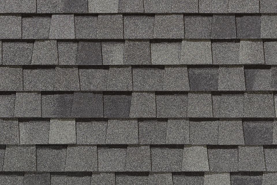 Gray asphalt shingle roof, with varied shades of gray.