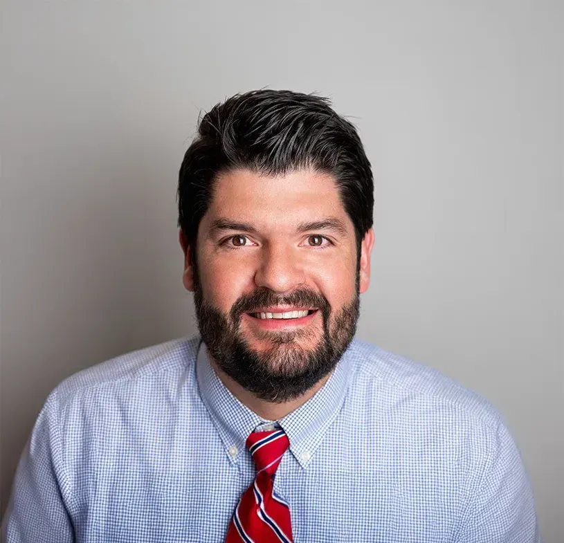 Photo of {{Team Member Name}}