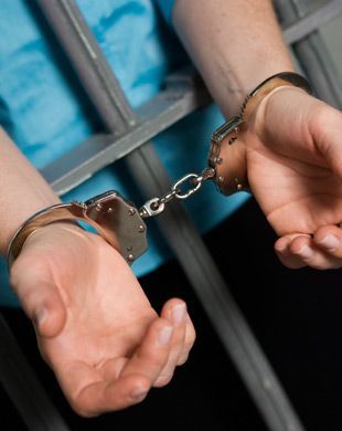Hands in handcuffs