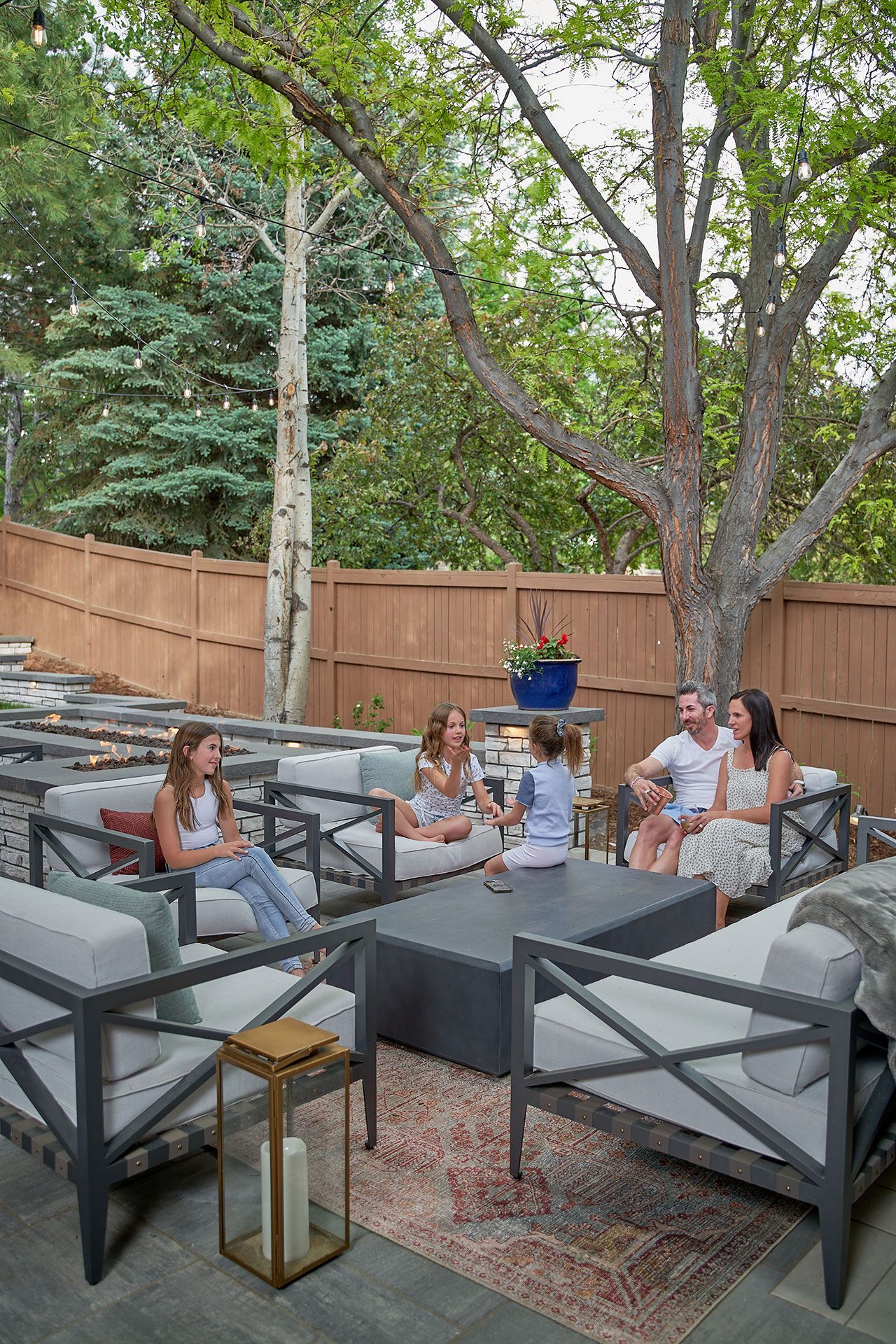 family on outdoor chairs