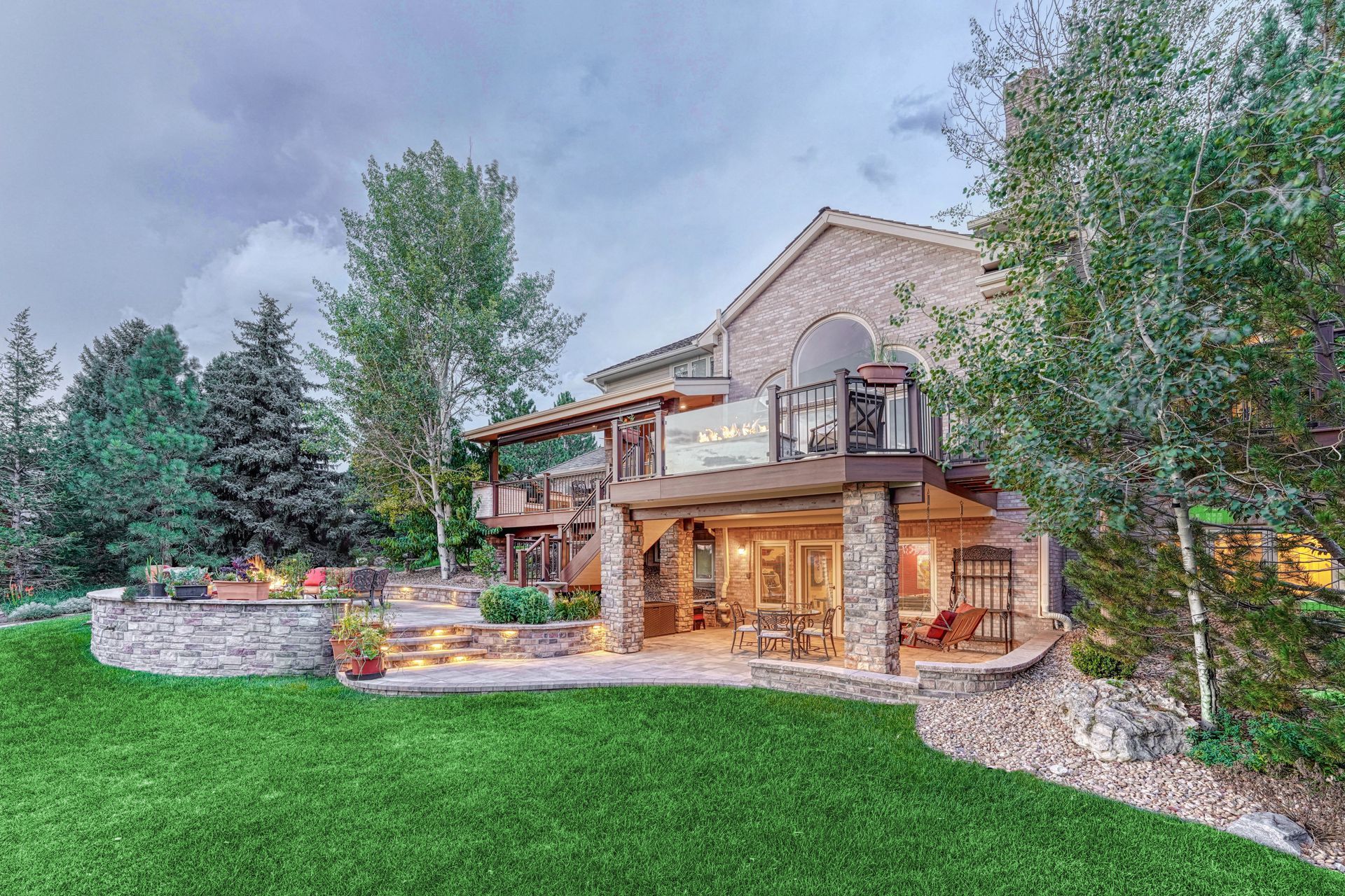 a large house with a large lawn in front of it