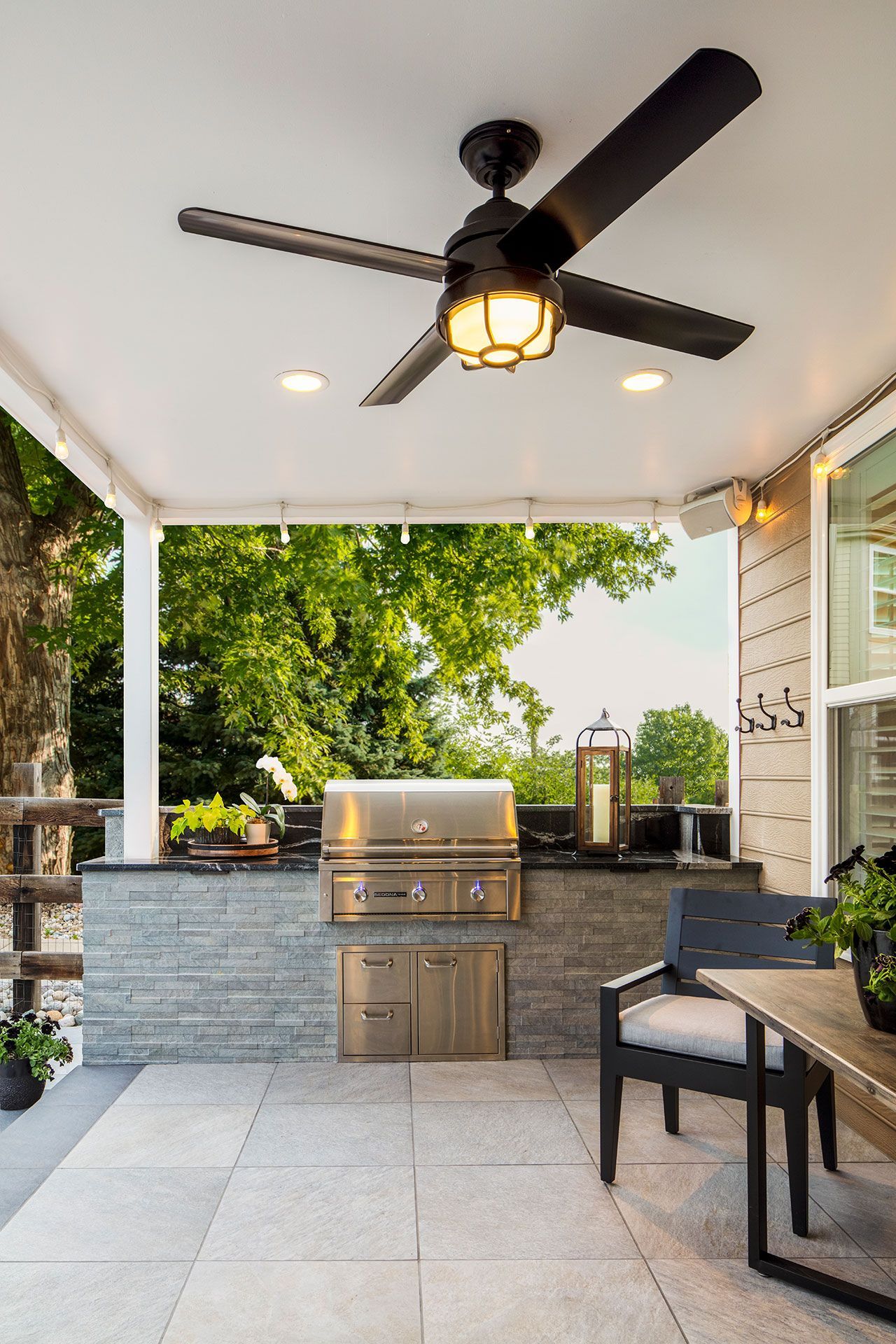 outdoor space with ceiling fan