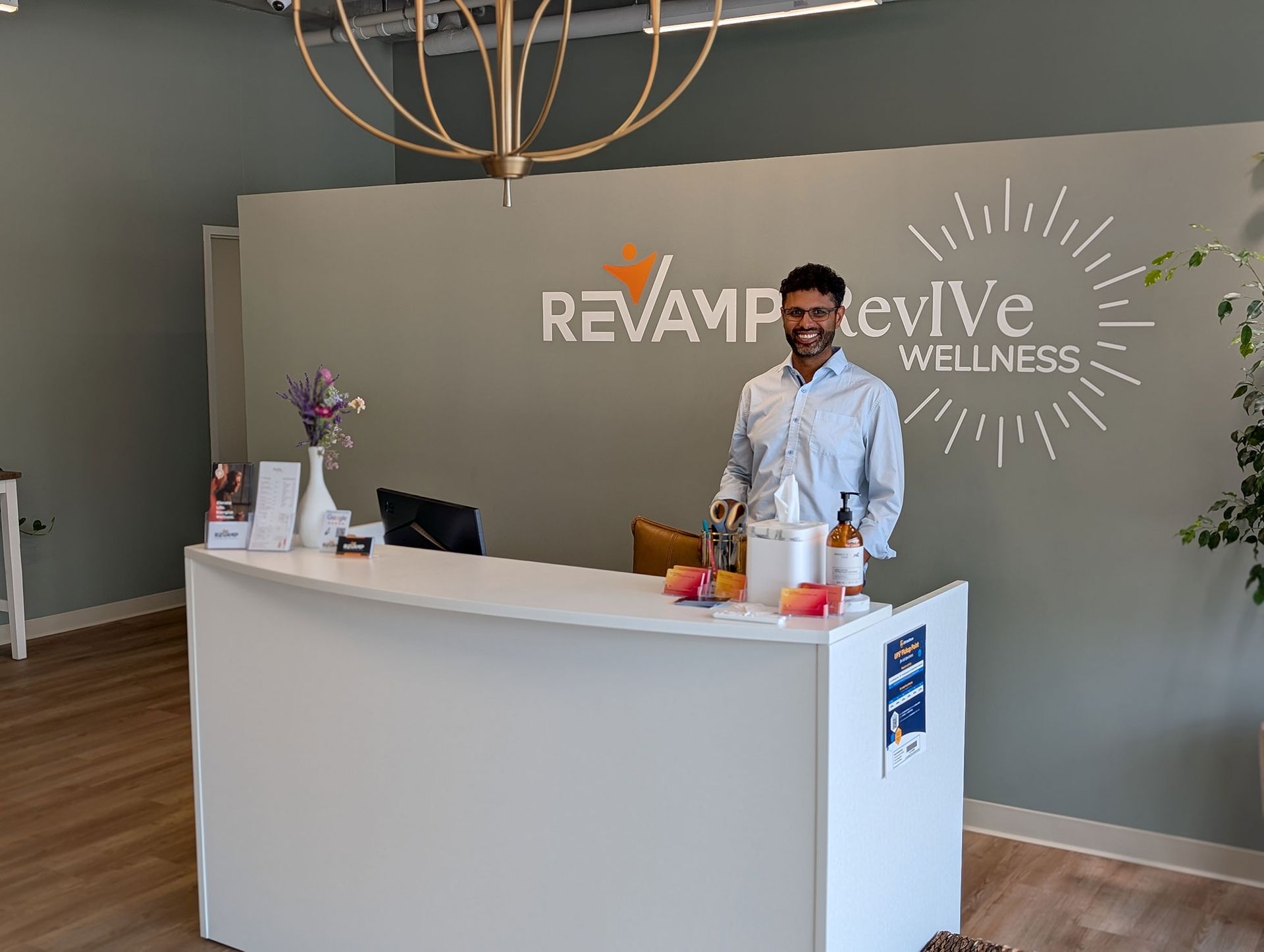 Man at the reception desk of a 