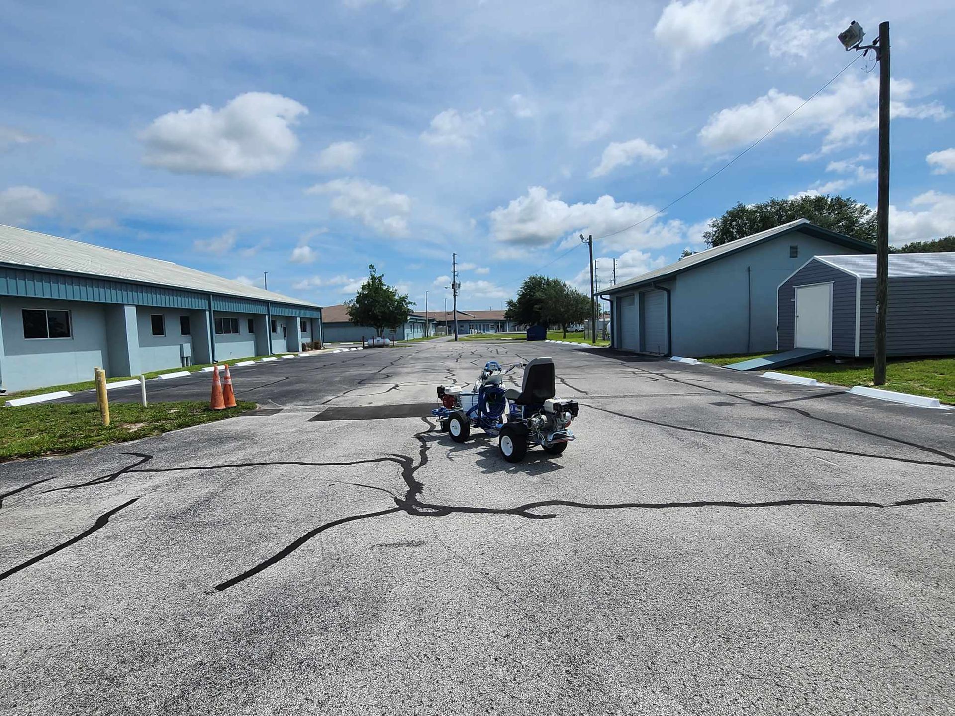 A motorcycle is parked on the side of the road