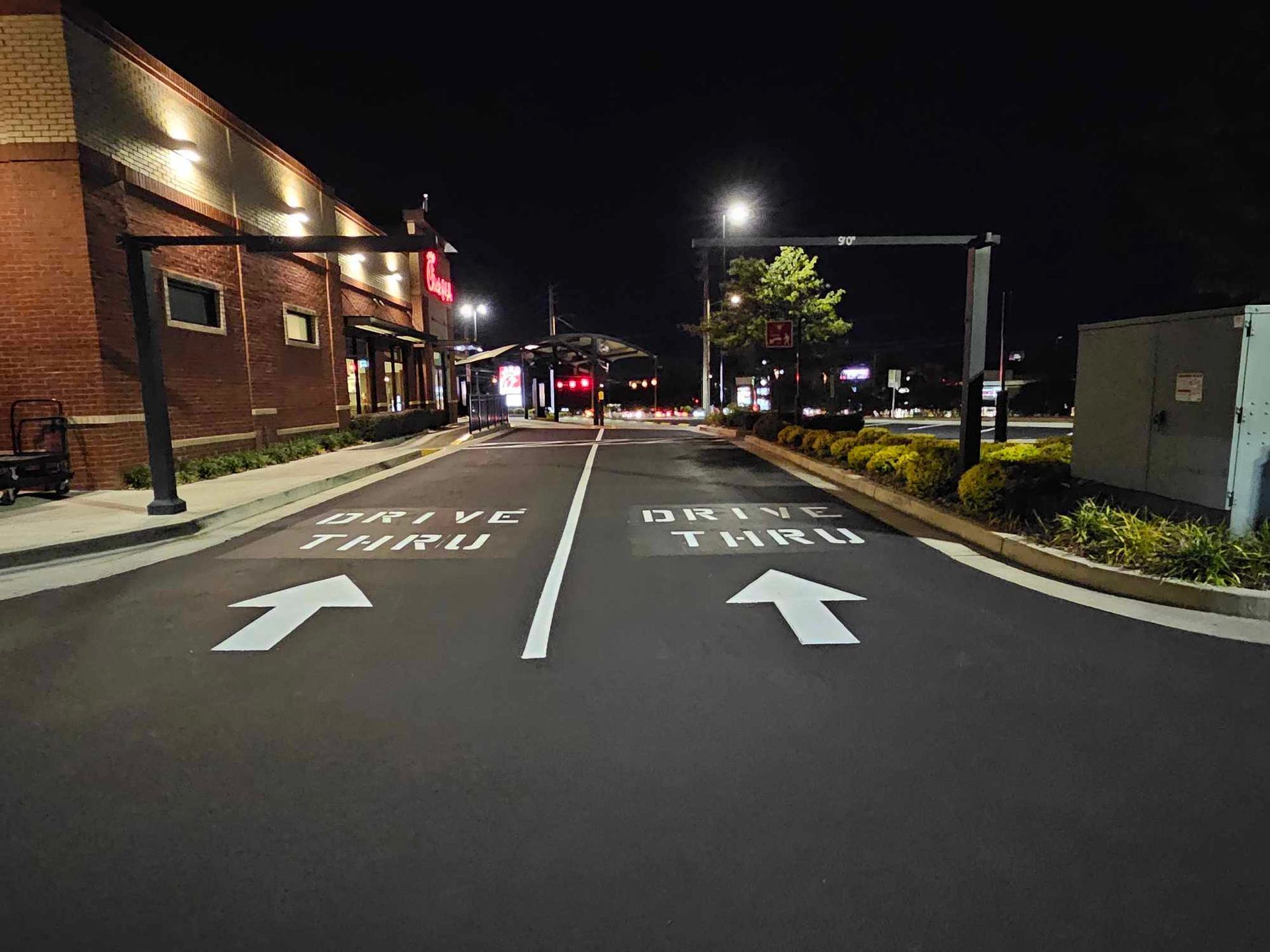 A drive-thru is painted on the side of the road