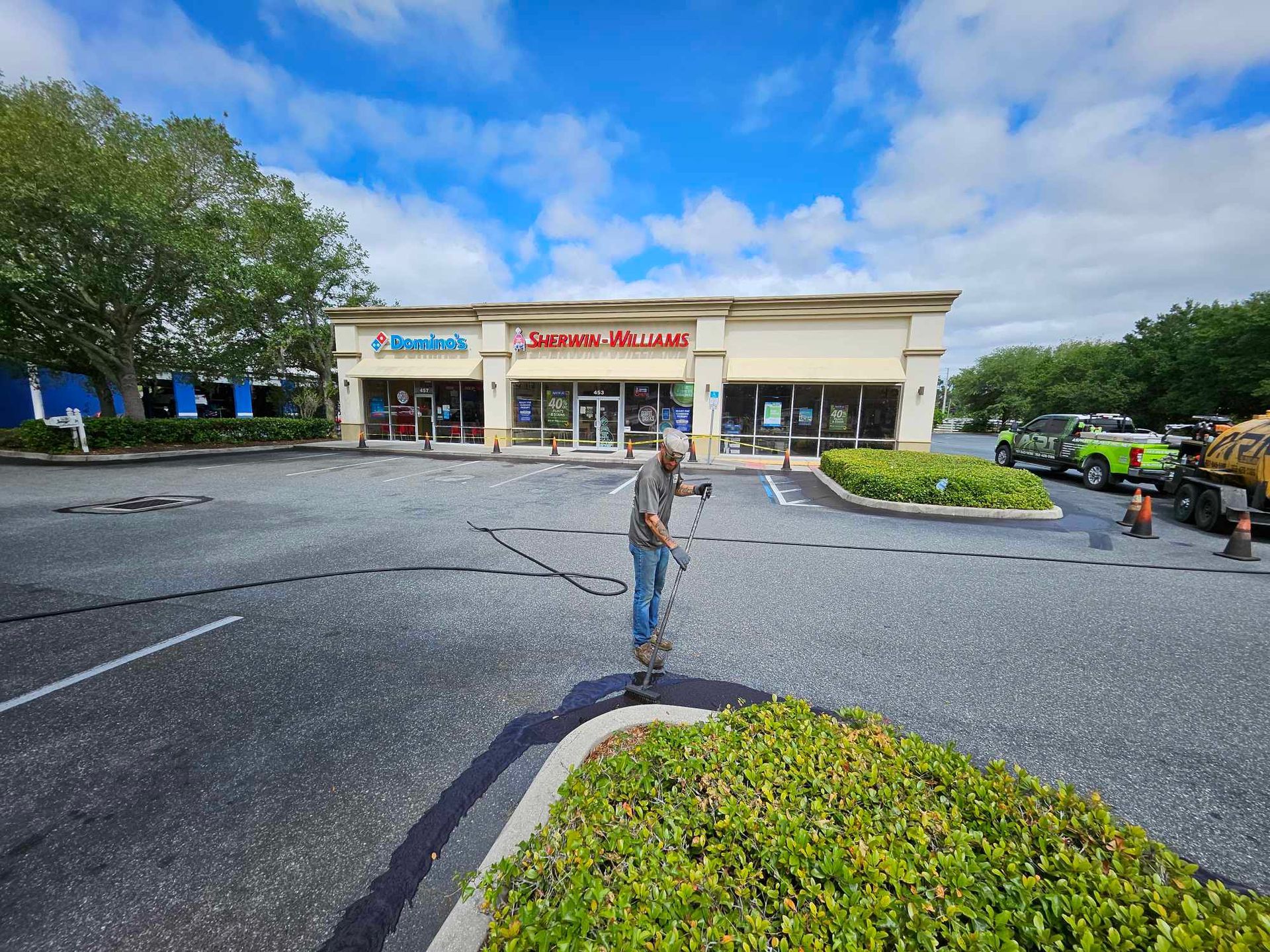 A parking lot in front of a building
