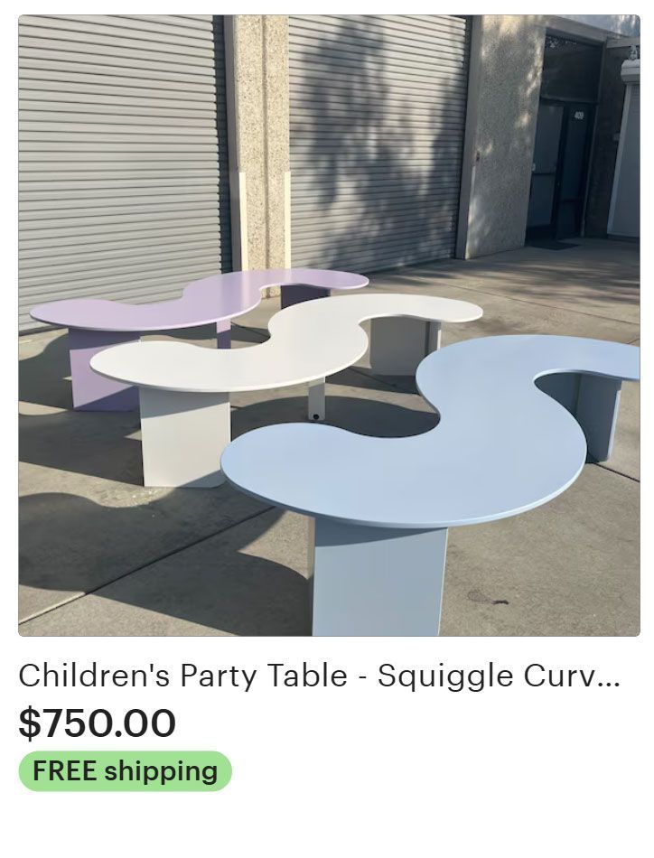 Three colorful, squiggly children's party tables: purple, white, and blue.