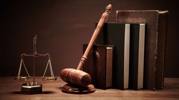 justice scale, law books and gavel