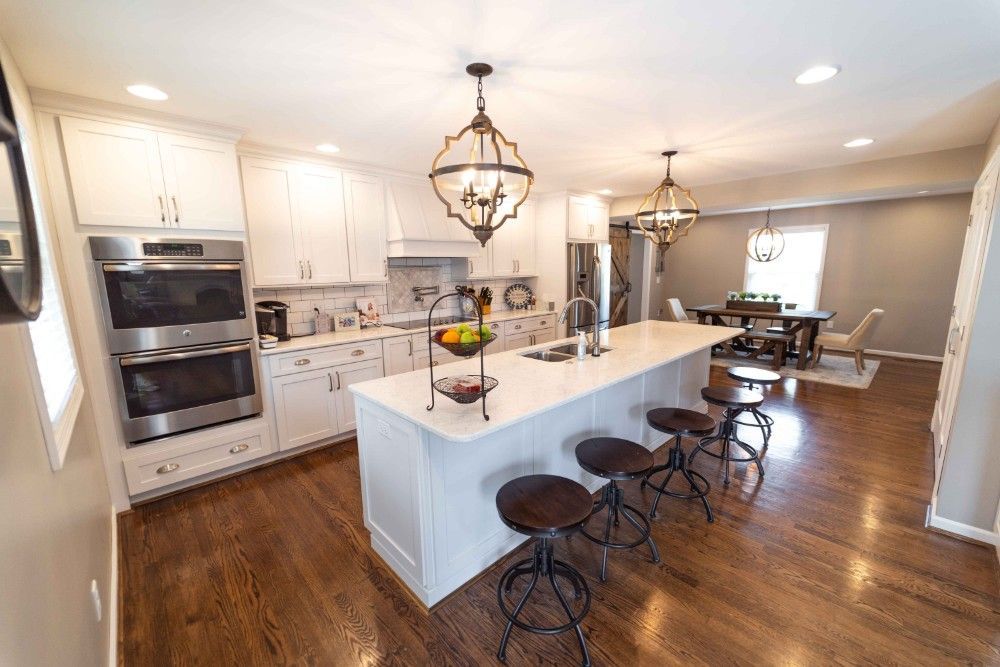 There is a large island in the middle of the kitchen.