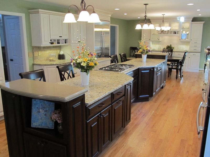 There is a large island in the middle of the kitchen.