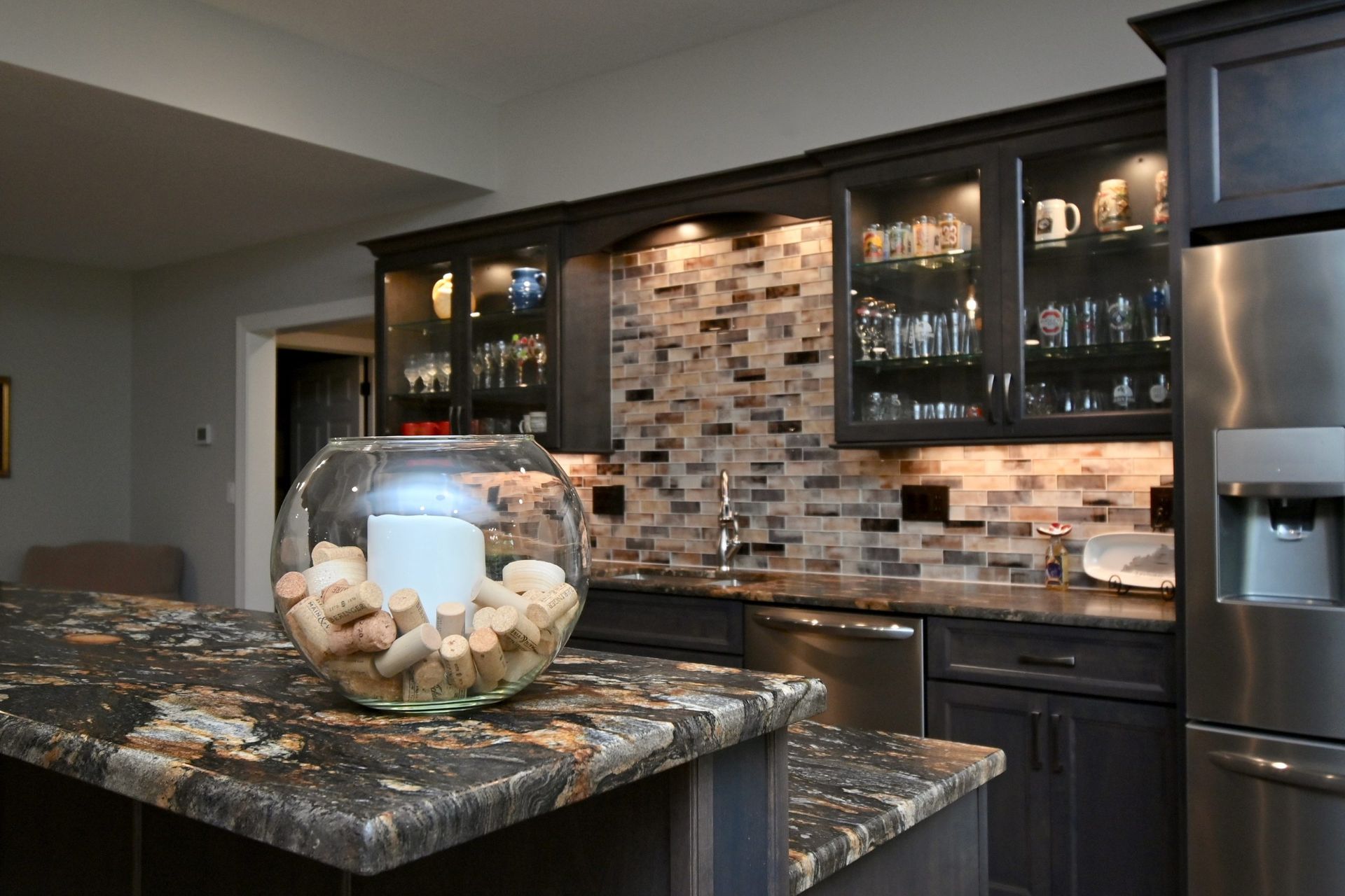 A kitchen with stainless steel appliances and granite counter tops