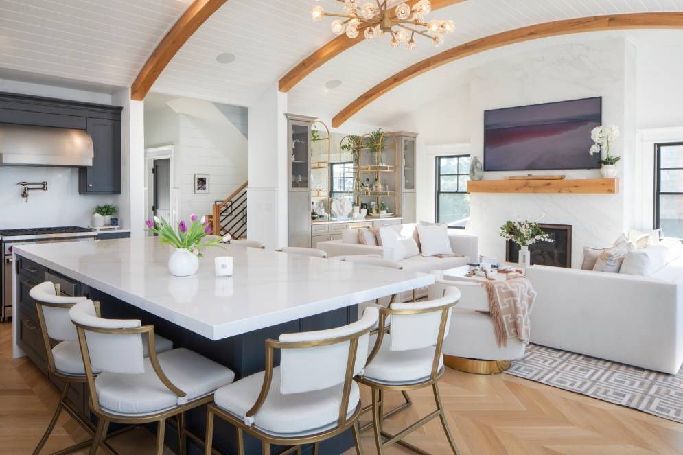 There is a large island in the middle of the kitchen.