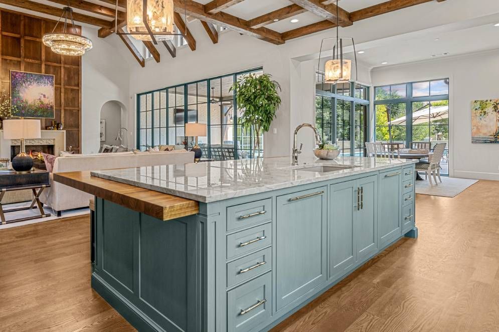 There is a large island in the middle of the kitchen.