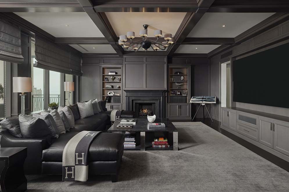 A living room filled with furniture and a fireplace.