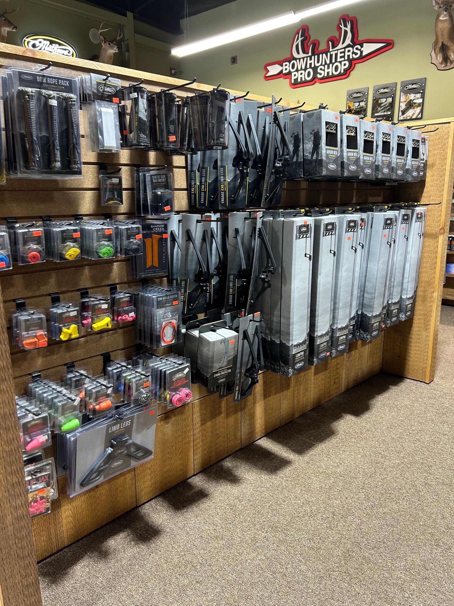 a store filled with lots of different types of bows and arrows