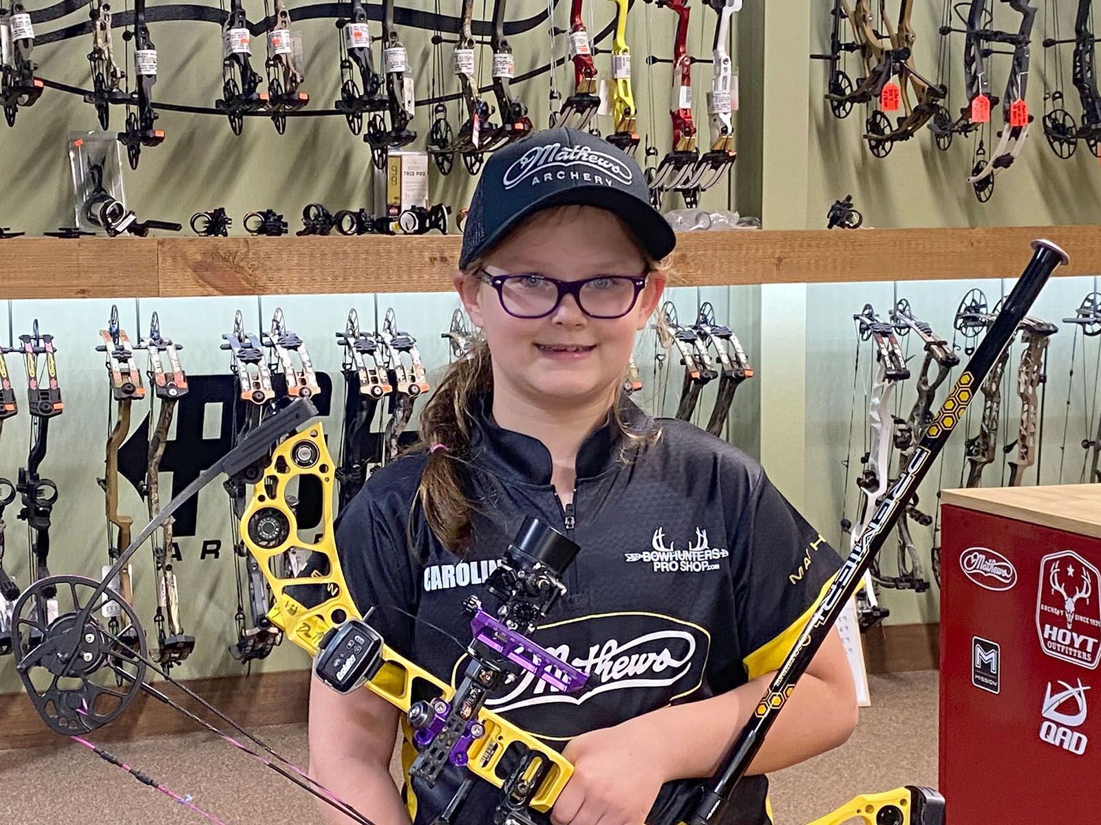 A girl holding a bow