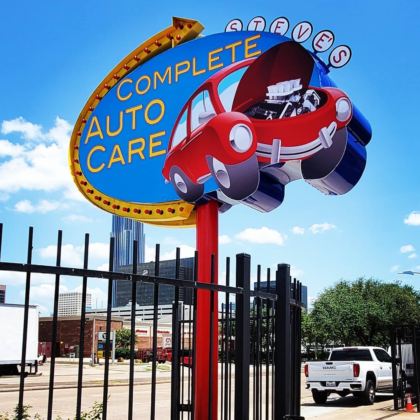 A sign that says complete auto care on it