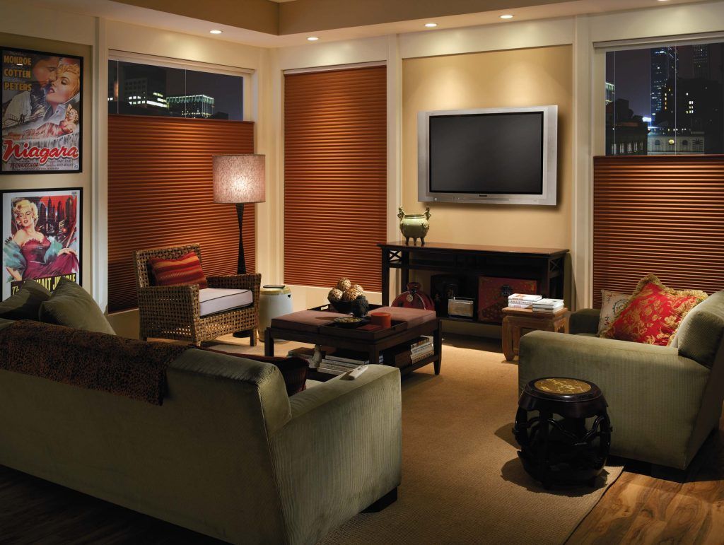 A living room filled with furniture and a flat screen tv