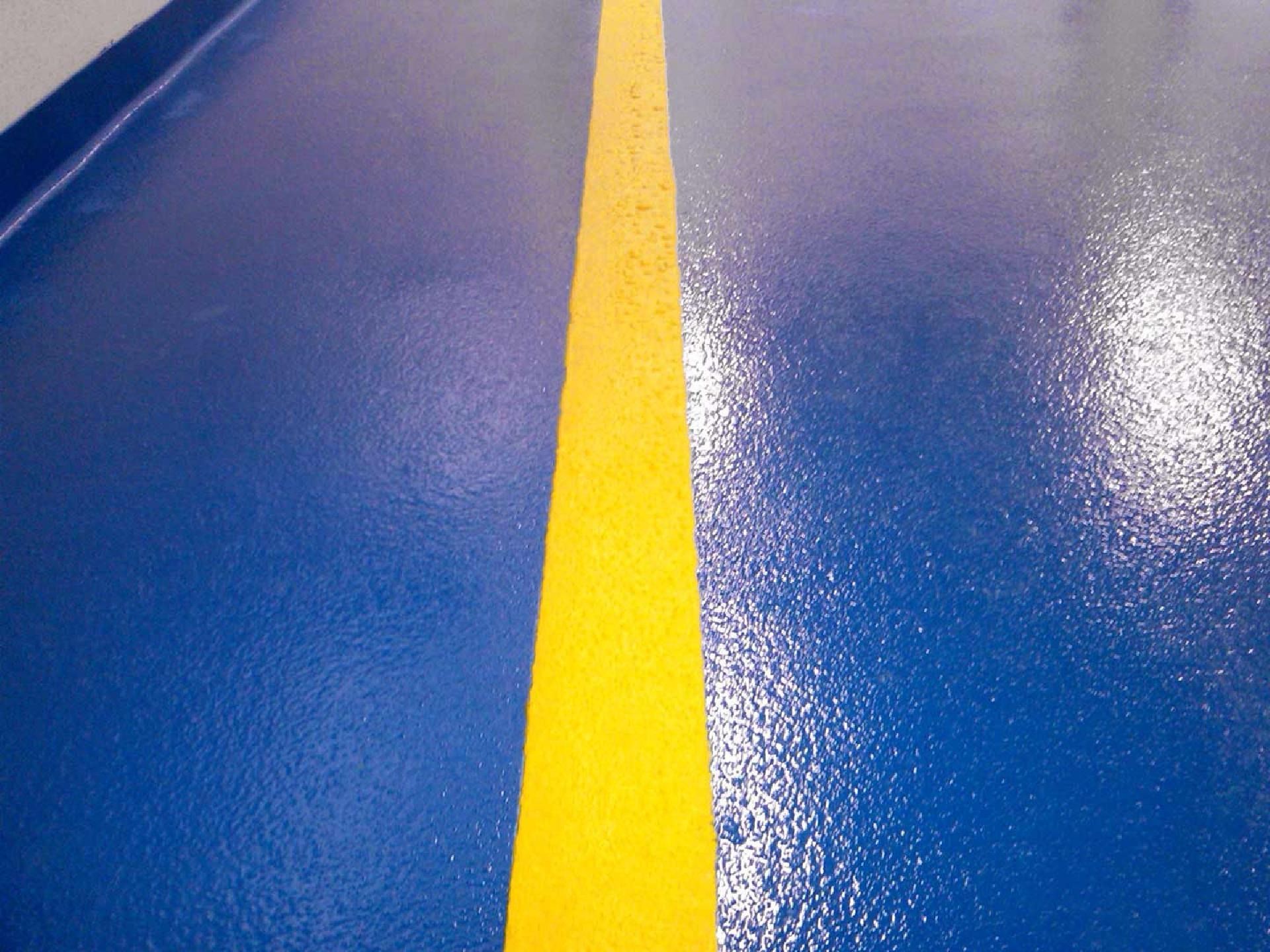 Blue floor with a yellow line running down the center.