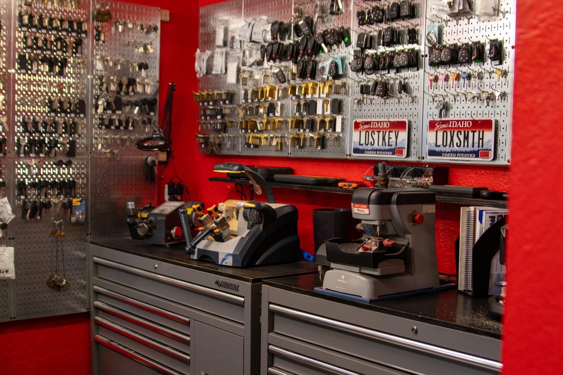 A bunch of keys hanging on a rack in a store
