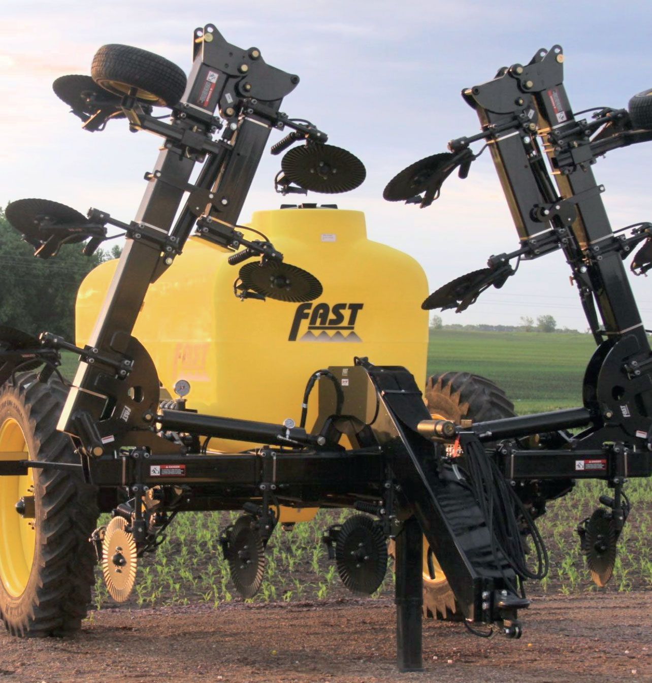 A yellow tractor with the word fast on it