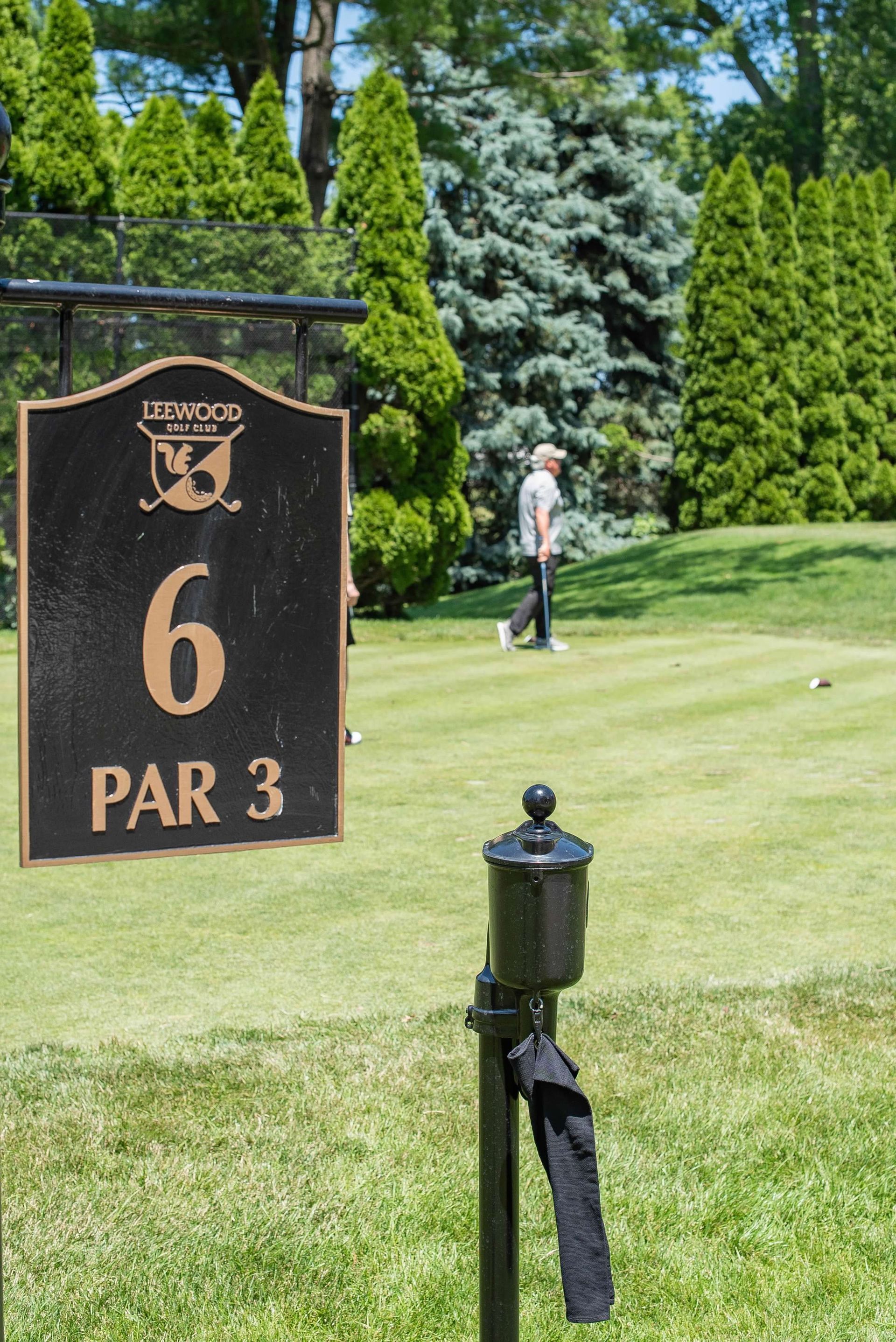 Golf course hole marker 