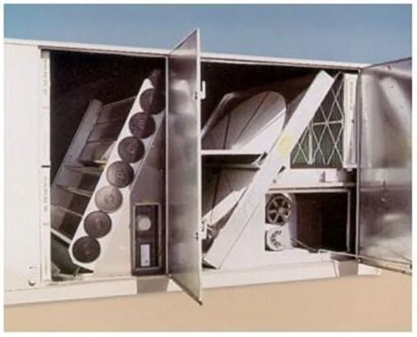 Exterior of an air conditioning unit with open doors, showing interior components, including filters and fans.