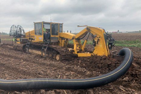 Heavy equipment used farm drainage system