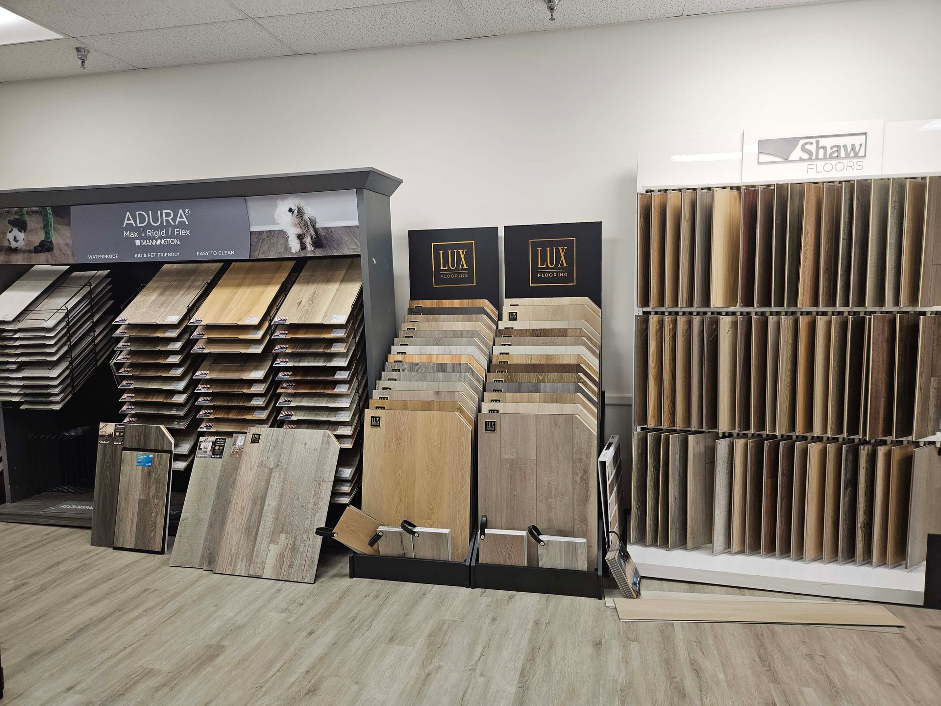 a showroom filled with lots of different types of flooring .