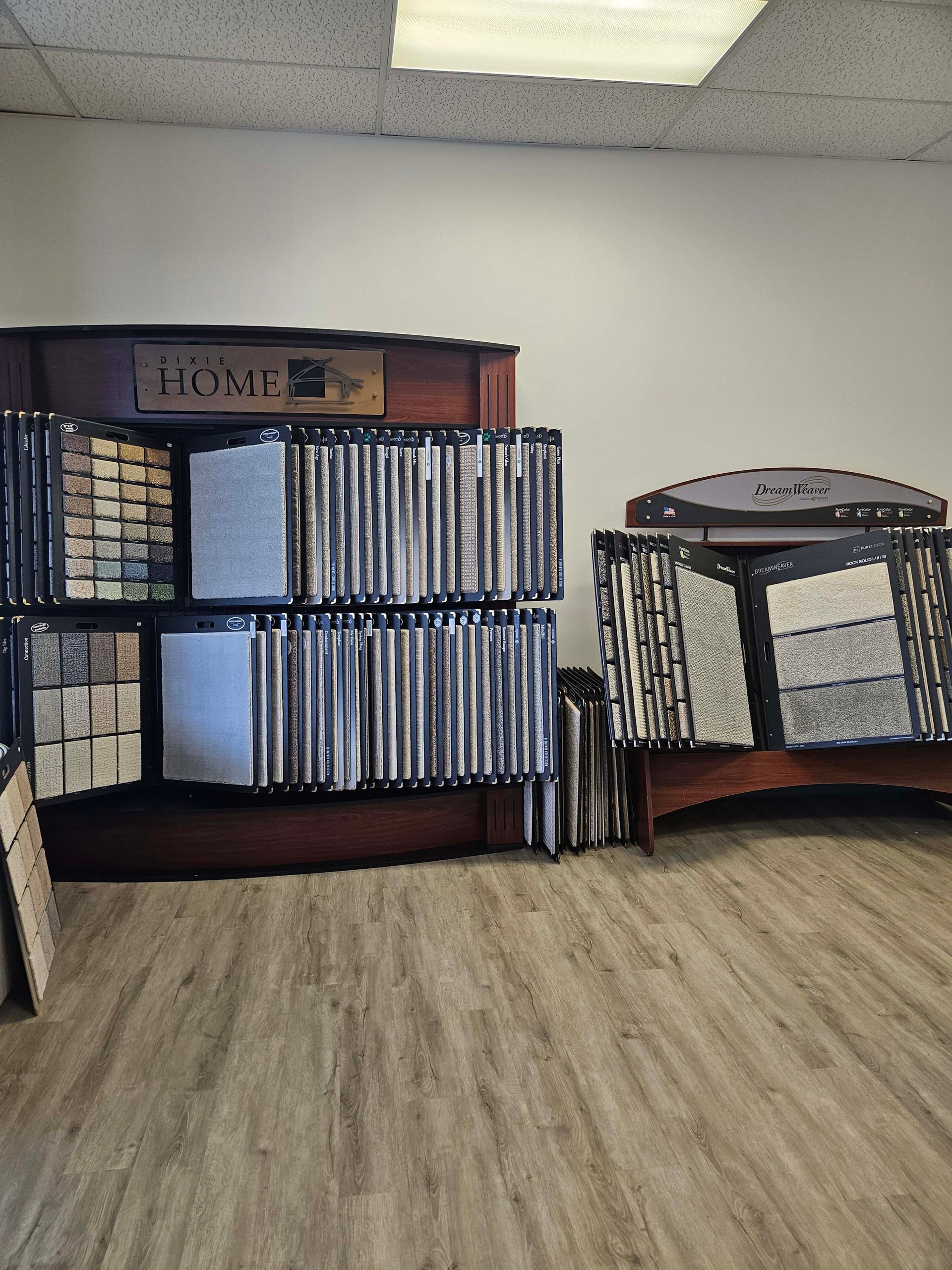 there are many different types of tiles on display in this room .