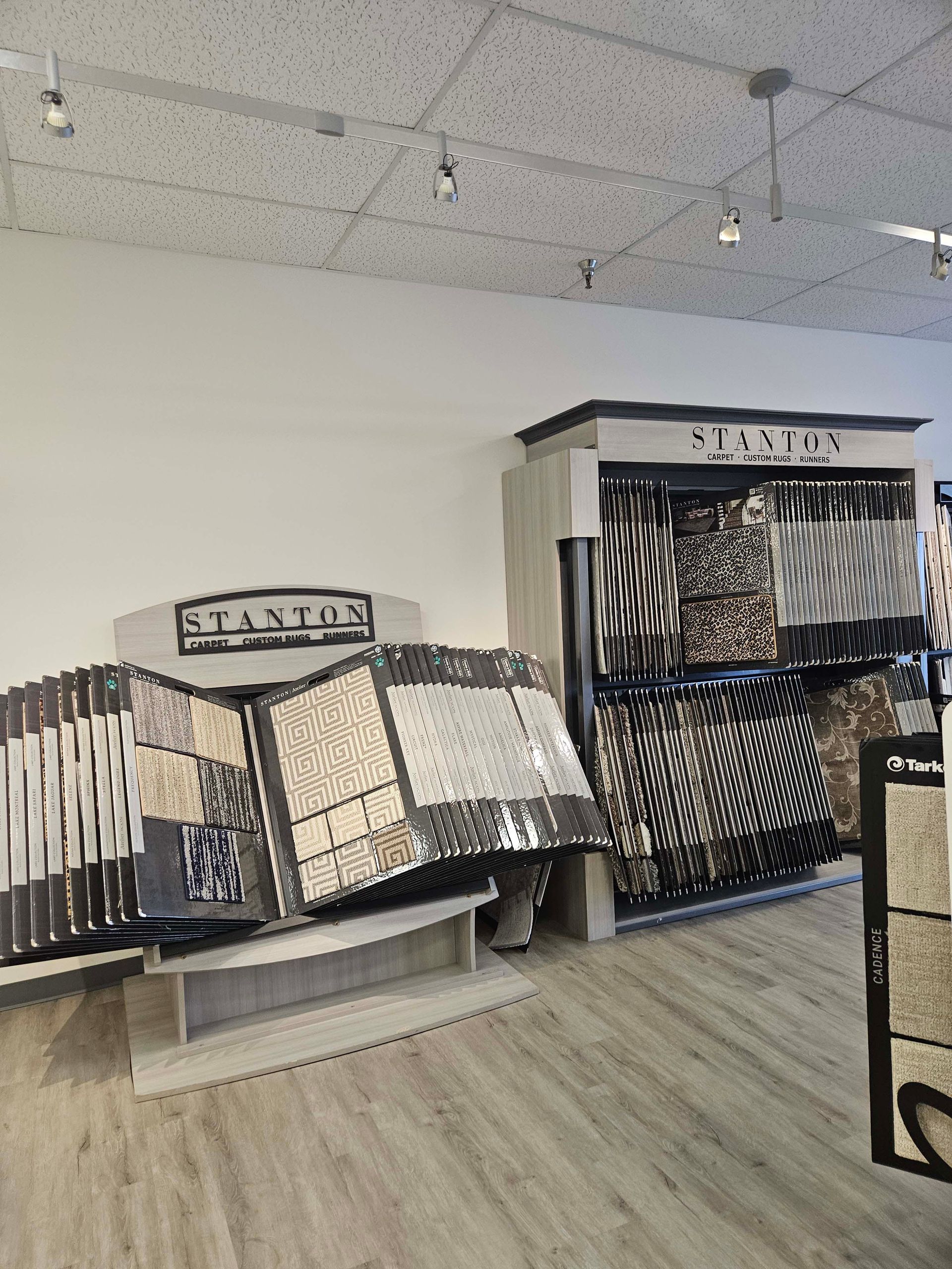 a store filled with lots of carpets and tiles