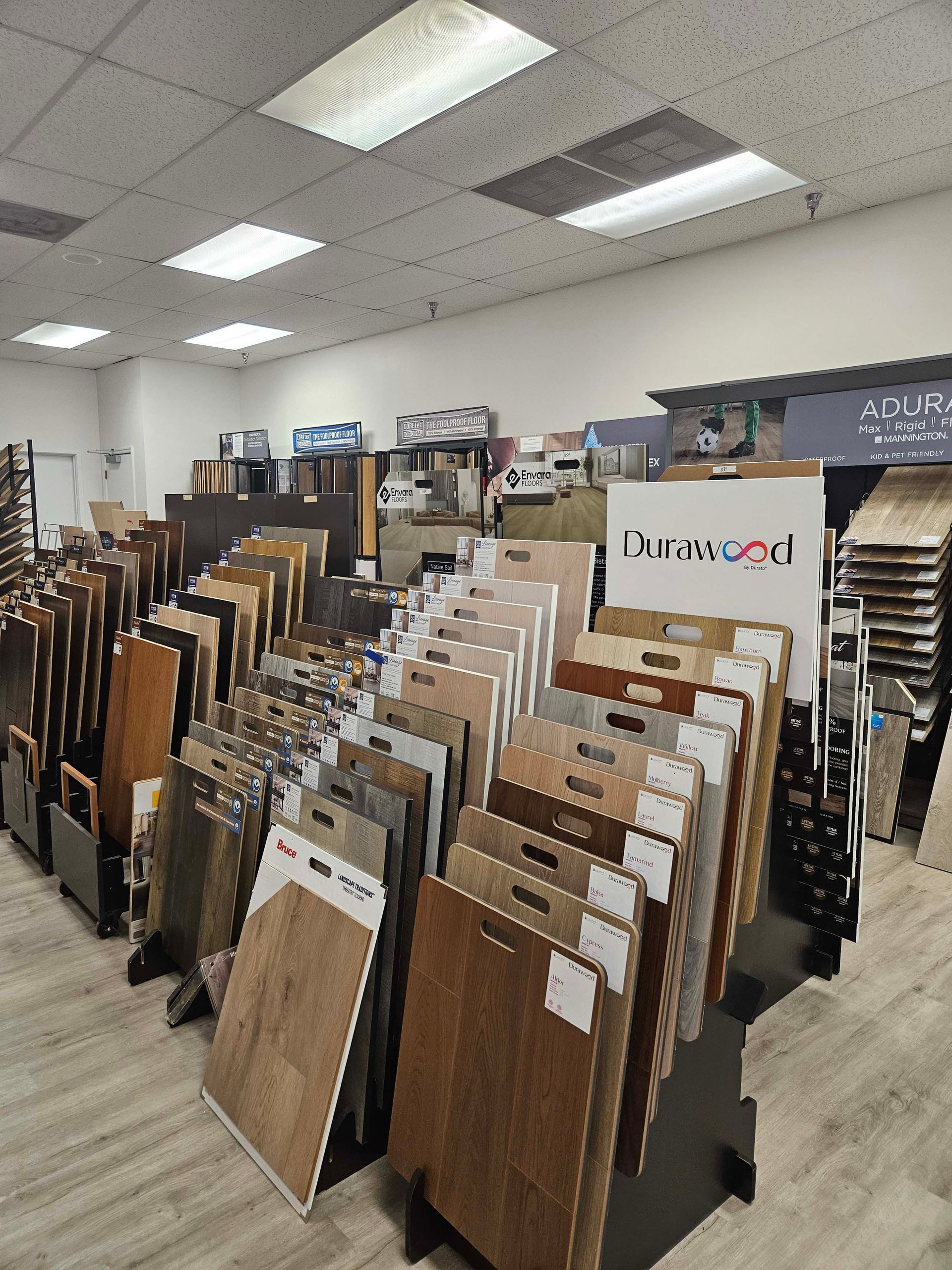 a store filled with lots of different types of flooring .