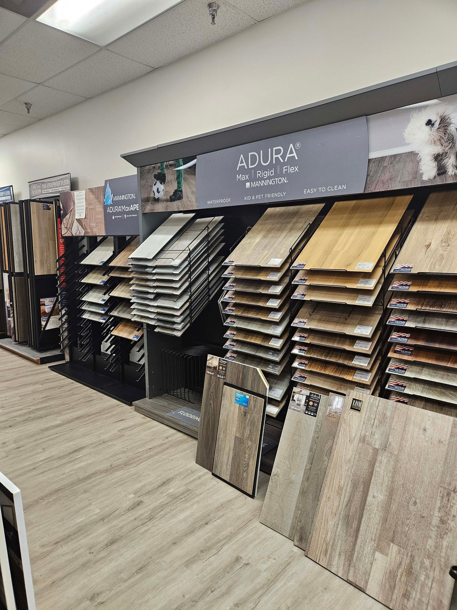 a store filled with lots of different types of flooring .