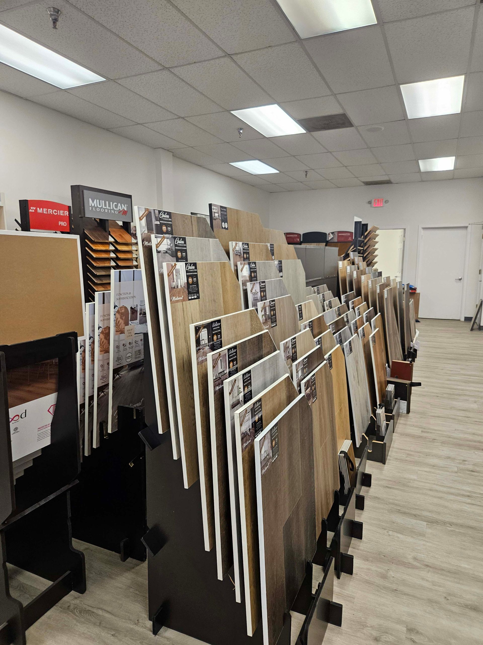 a large room filled with lots of tiles on display .