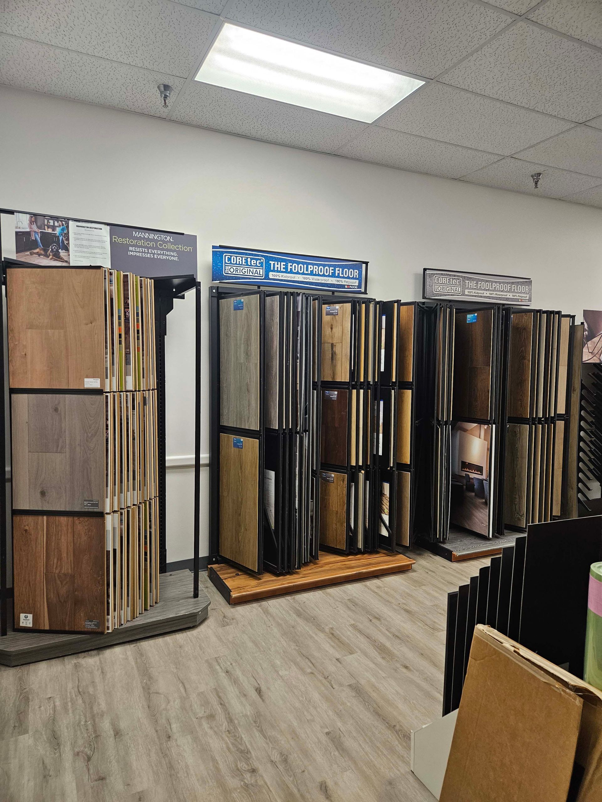 a store filled with lots of different types of flooring .