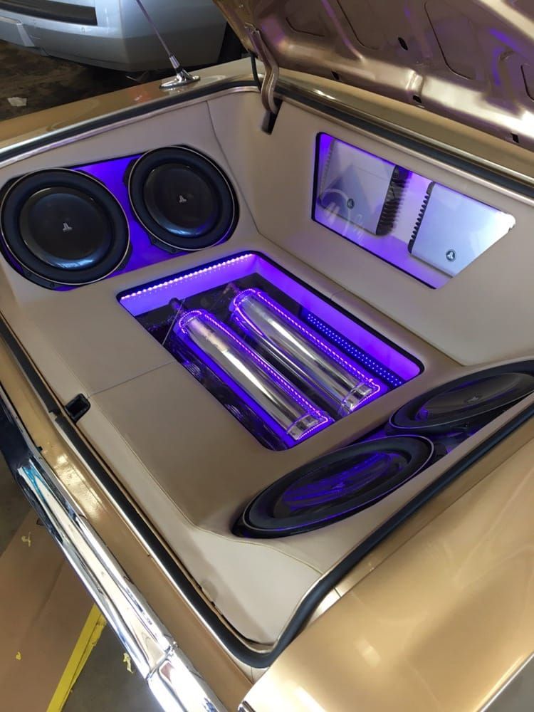 JL Audio in truck with purple lights