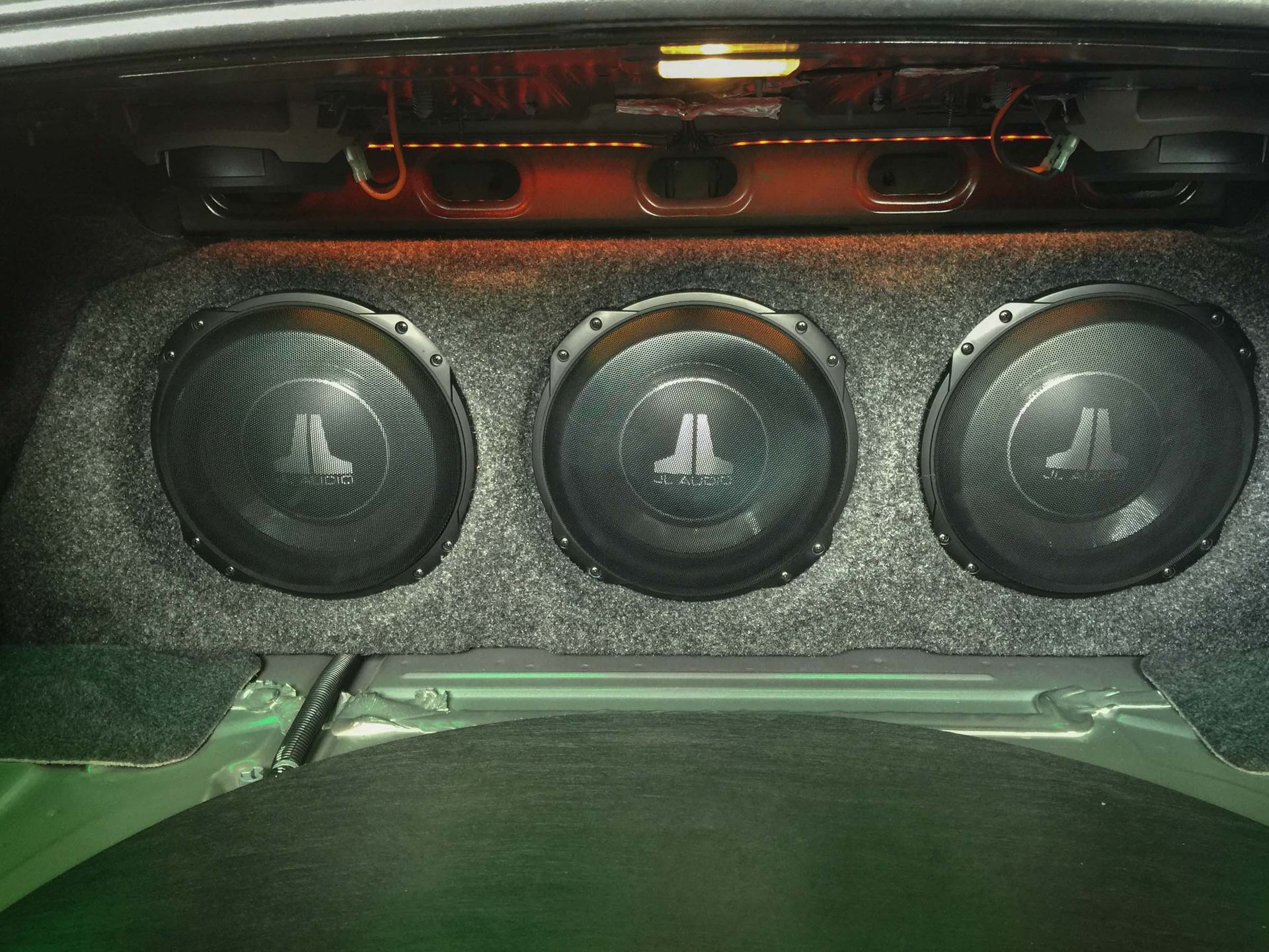 JL Audio installed in a trunk