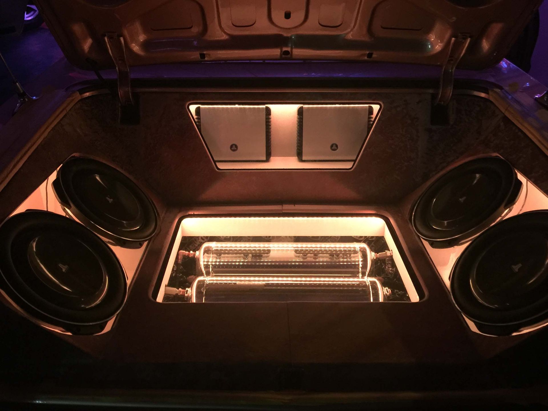 Car trunk with stereo and orange lights