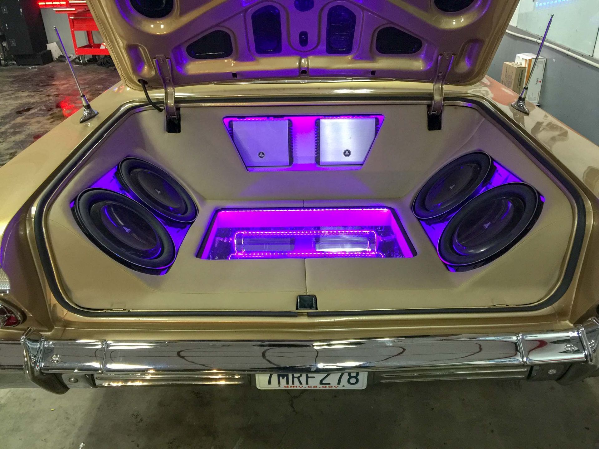 Car trunk with stereo and purple lights