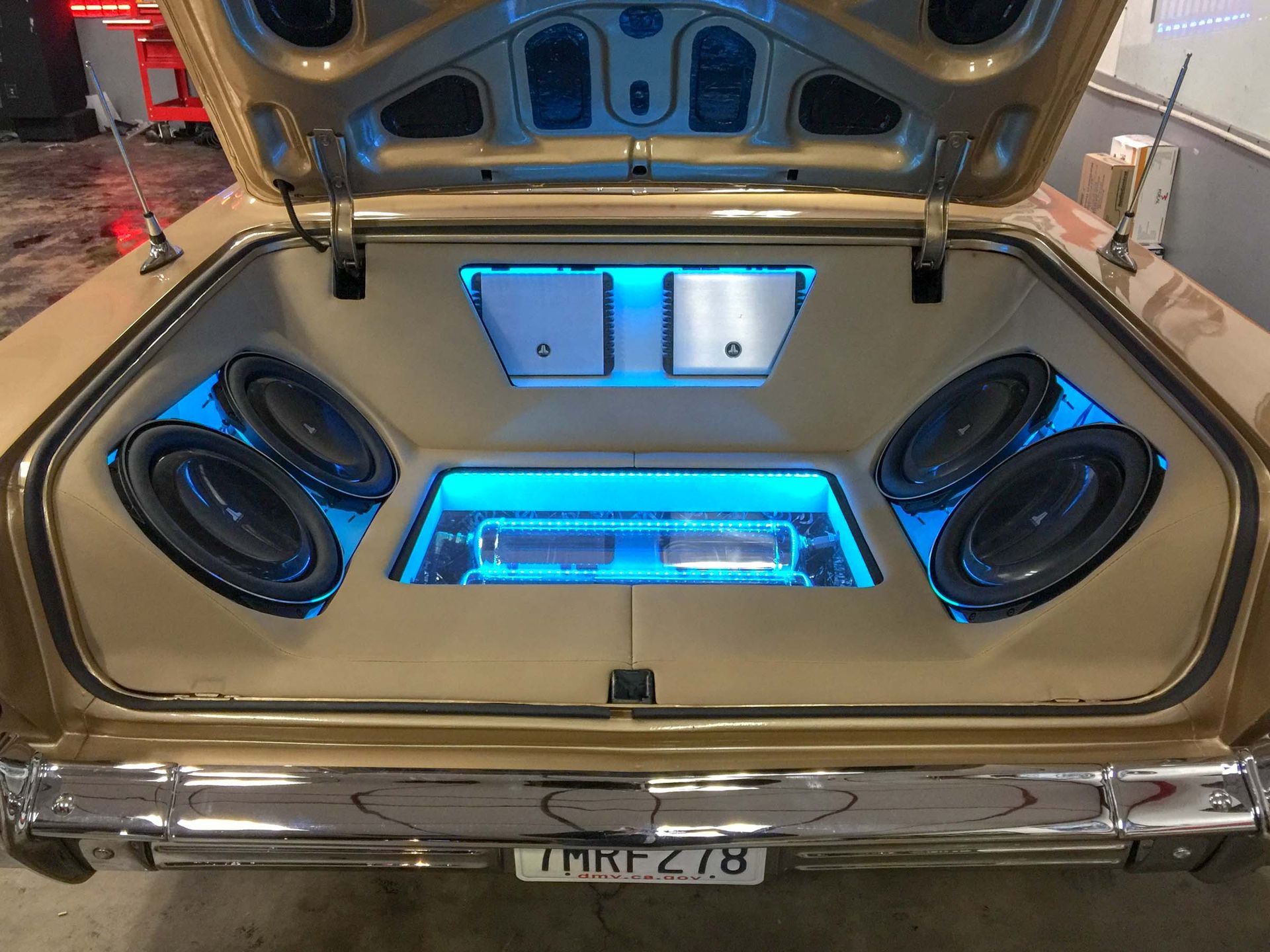 Car trunk with stereo and blue lights