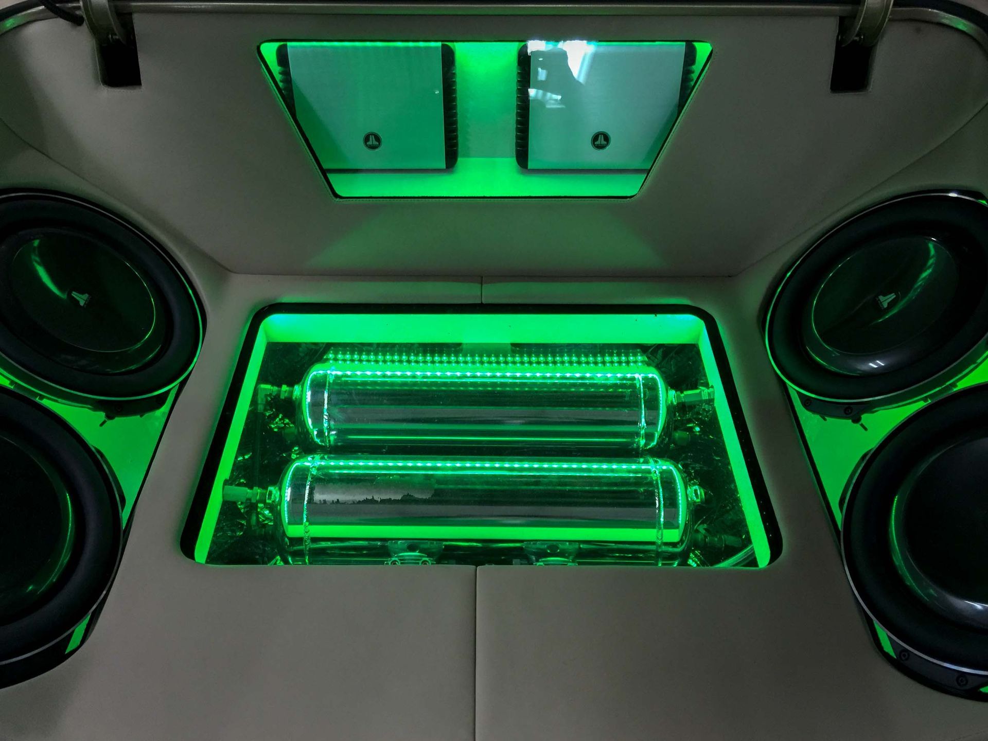JL Audio speakers with green lights