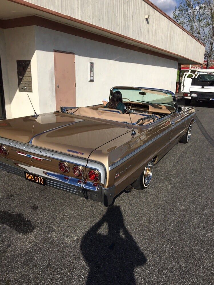 Brown Chevy Impala work
