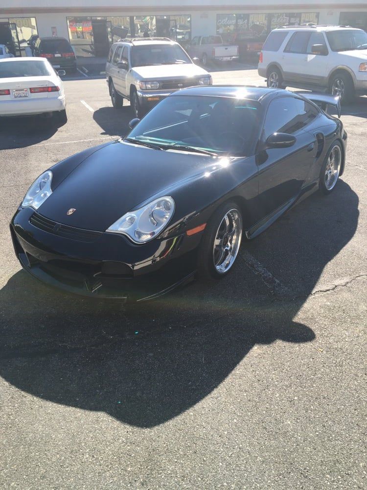 Porsche in a parking lot