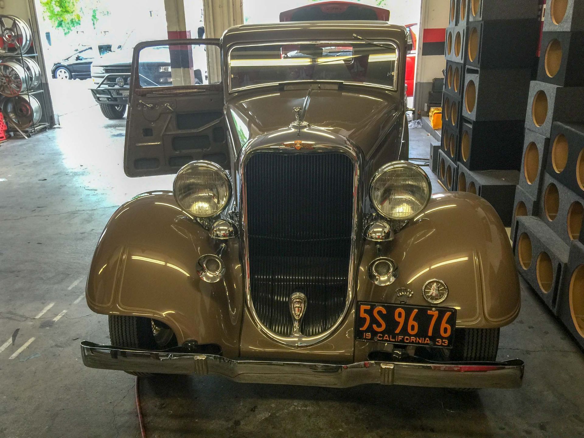 Vintage car in a car audio installation shop