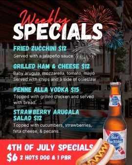 A weekly specials menu for a restaurant with a taco salad and pulled pork tacos.