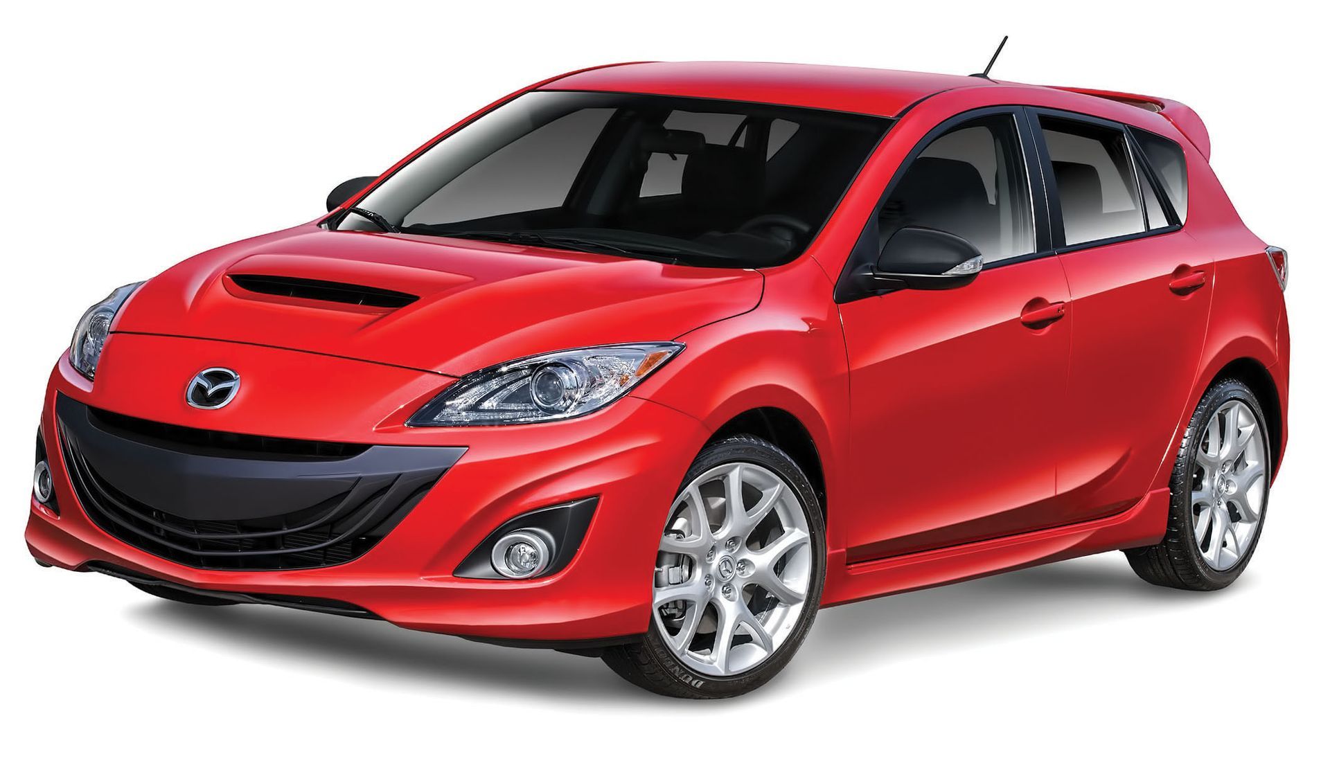 Red compact hatchback car in bright red, front three-quarter view on white background
